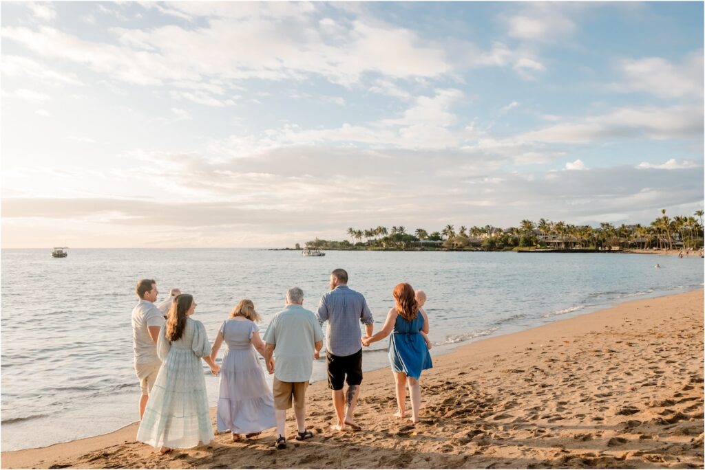 A Bay Beach - family walking down the beach