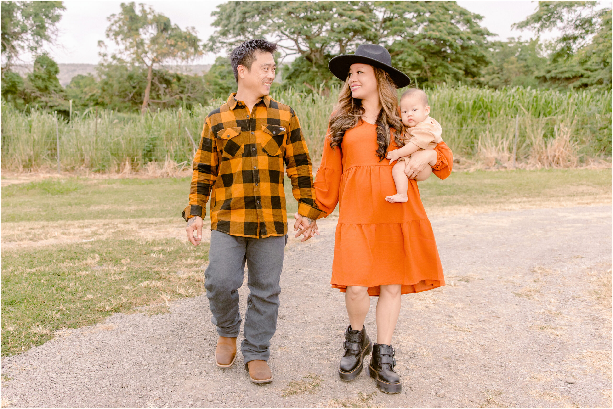 Hawaiian fall photos with a couple and their baby