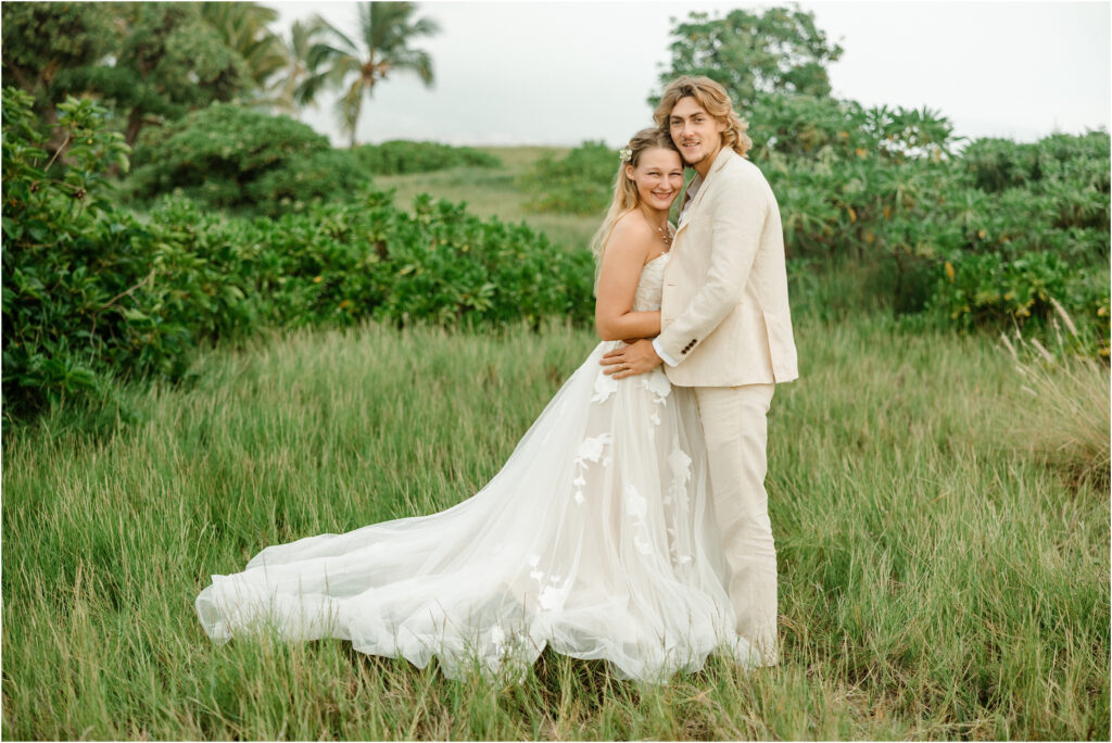 Bride and groom at Old Kona Airport beach