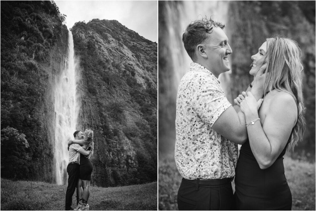 black and white photo of newly engaged couple by the waterfall
